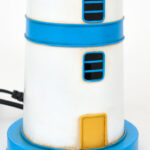 faro-decorativo-metal-azul-amarillo-luz-marmare.jpg