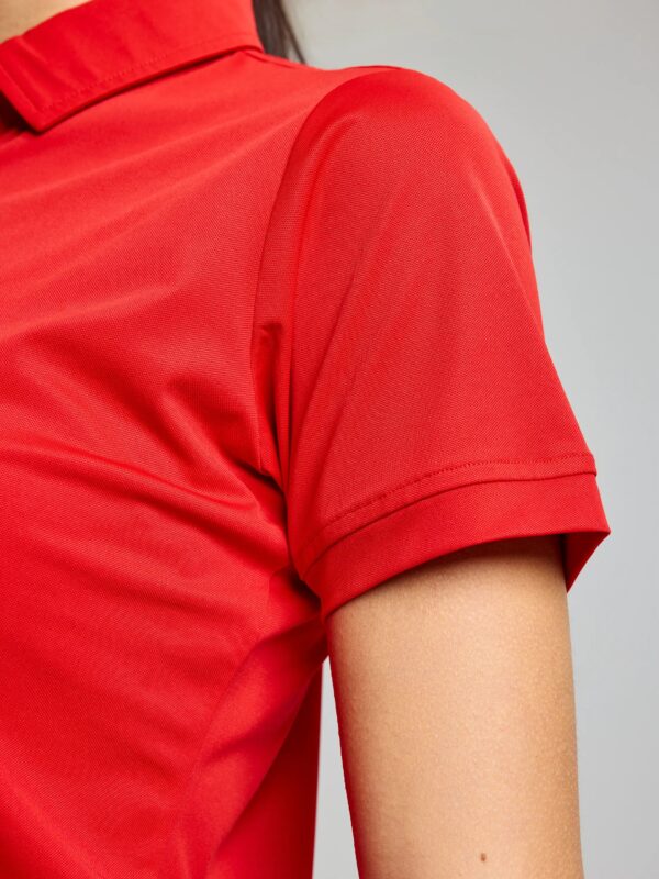 polo-vela-femenino-slam-real-red-detalle-logo-manga-marmare.jpg